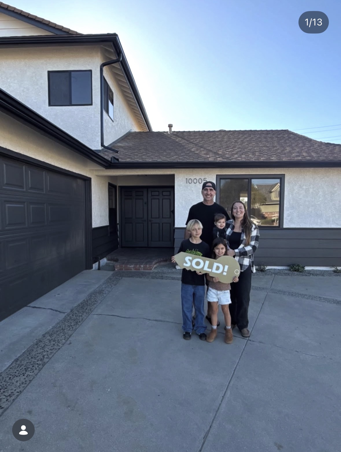 family happy infront of their ventura home after Jess helped them purchase it